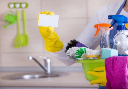 Office cleaners working in a Docklands commercial workspace